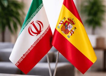 تصویر پرچم‌های ایران و اسپانیا در راستای توسعه روابط تجاری و فعالیت اتاق مشترک ایران و اسپانیا